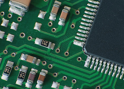 特写绿板上的电子部件  info tooltip活力电路处理器主板芯片宏观电路板晶体管电脑金属图片