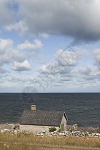 水边的旧农舍国家建筑学窗户烟囱小屋海岸线草房住宅屋顶农家图片