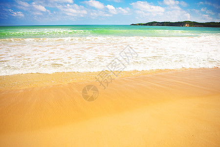 桑迪海滩海浪假期天空热带海岸线天堂海洋海岸支撑闲暇图片