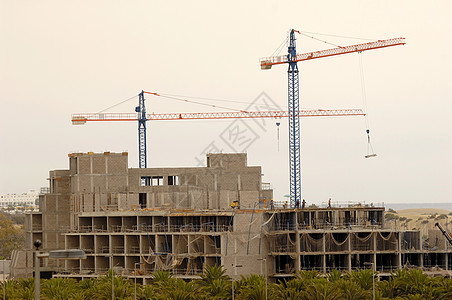 建筑工地吊车职场项目住房建设者蓝色工人男人职员房地产背景