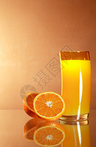 灯光效果橙汁冷饮灯光健康饮食水果果汁饮食玻璃黄色效果饮料背景