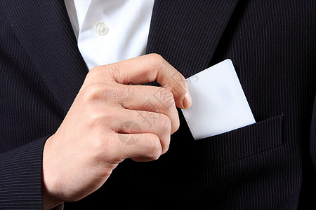 持有贺卡的商务人士身份领带工人管理人员手指人士衣服商业商务金融图片