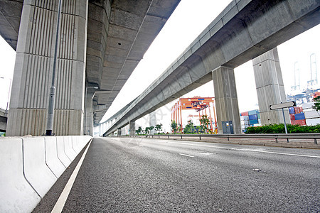 桥下高速公路旅行曲线戏剧性太阳云景自由速度风景树木天空图片