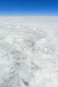 云上飞翔场景旅行航班地平线自由气象天气阳光蓝色天空高清图片