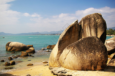 中国海南三亚的海滩温泉晴天阳光季节海浪蓝色海洋世界地平线假期图片