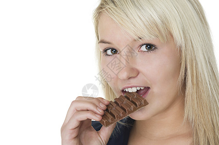 喜欢吃巧克力的有吸引力的女人高清图片