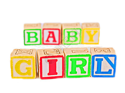 拼写字词BB女孩的多彩字母区块阅读公司黄色绿色正方形立方体婴儿孩子红色玩具图片