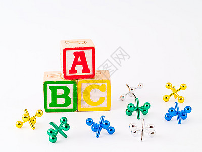 以儿童为主题的ABC和Jacks组合千斤顶幼儿园教育英语拼写蓝色立方体学习字母白色图片