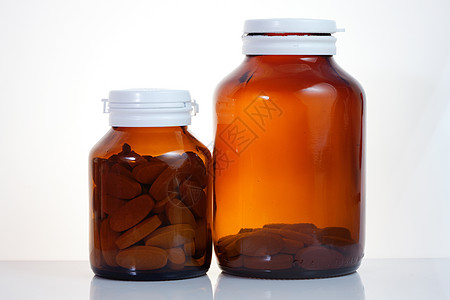药品瓶疾病预防宏观补充治疗食物矿物质药物胶囊白色图片