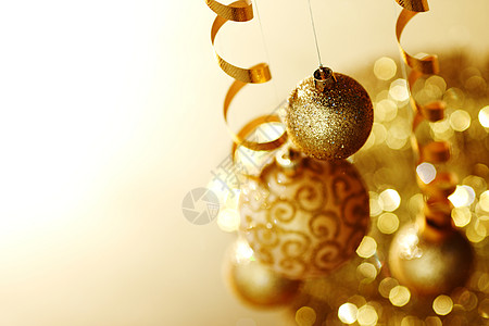金金色圣诞魔法团体灯泡装饰品庆典玻璃金子圆圈装饰风格背景图片