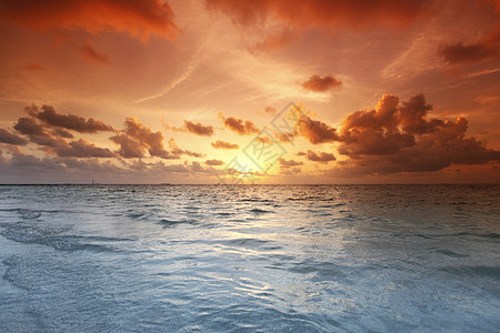 海滩日落风景海洋热带太阳冲浪反射天空旅行海岸阳光图片