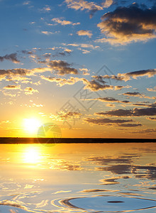 日出在海中橙子日落魔法天际海岸线地平线阳光海岸反射太阳图片