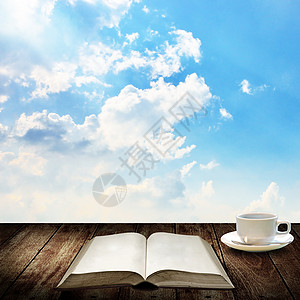 咖啡杯 有一本好书 放松概念图片