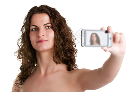 妇女用手机拍相片图片