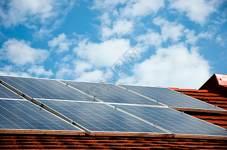 建筑物屋顶上太阳能电池板电池板的电池板反射科学细胞控制板发电机力量环境集电极天空创新图片