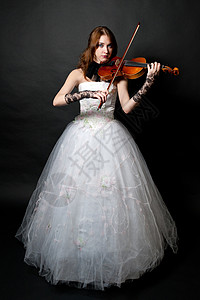 穿着白衣服的女孩和小提琴细绳魅力音乐艺术音乐家乐感成人女性音乐会乐器图片