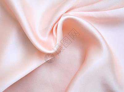 平滑优雅的粉色丝绸作为背景折痕材料版税礼物银色感性织物生产海浪纺织品背景