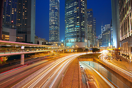 现代城市 晚上有高速公路交通 香港州康建筑速度日落摩天大楼蓝色场景街道旅游景观公共汽车图片