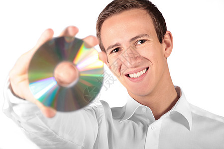 男子持有cd或dvd音乐记忆光盘微笑备份白色贮存成人电脑数据图片