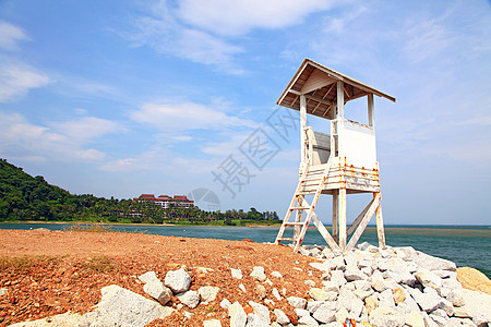 海滩高塔警卫建筑海岸天空岩石控制椅子草地灯塔安全热带图片