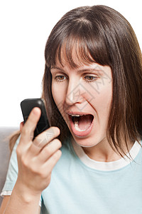 愤怒的女人在说手机高清图片