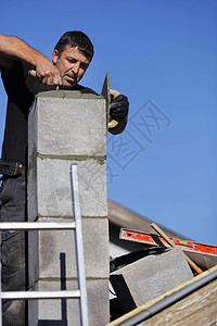 建造一栋房屋手套男性男人住房工作职员充气工具头盔石匠图片