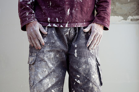 涂抹画画家的脏裤子石匠职业工作飞溅拼装水泥石工犯规工匠砂浆背景图片