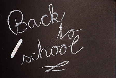 返回学校教育孩子们字母写作黑板背景图片