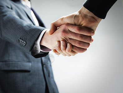 两位商务人士握手工作商业男性合伙办公室男士专业男子协议人士背景图片