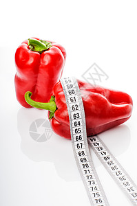 量制胶带中的红胡椒减肥厨房营养重量磁带烹饪生活损失饮食沙拉图片
