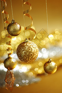 金金色圣诞火花假期魔法乐趣风格装饰品灯泡金子玻璃庆典背景图片