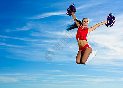 穿红装跳跃舞的啦啦队青年活力女孩快乐灵活性演员女士舞蹈平衡青少年霹雳舞图片