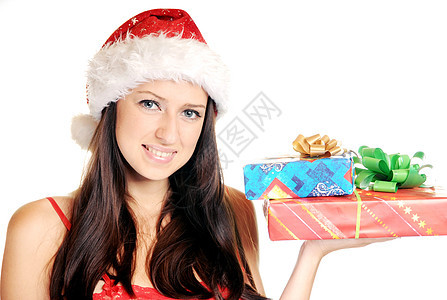 白色背景的美丽圣诞女孩 美丽的圣诞节女孩惊喜丝带乐趣工作室庆典盒子黑发礼物女士快乐图片