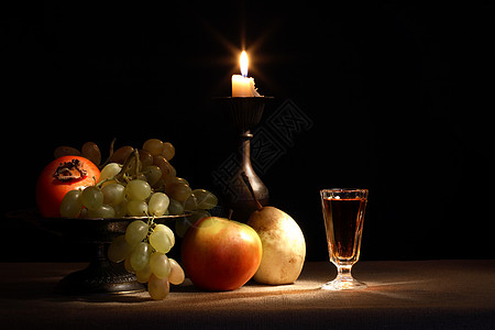 水果和蜡烛酒杯甜点阴影火焰晚餐帆布柿子时间古董饮食图片