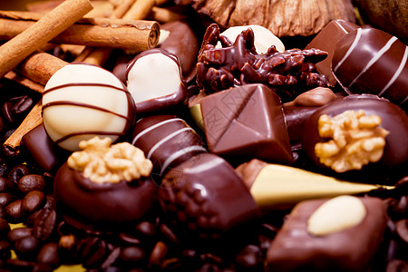 瑞士巧克力不同甜巧克力瓜子酱的收藏品食物松露牛奶可可小吃甜食甜点美食欲望礼物背景