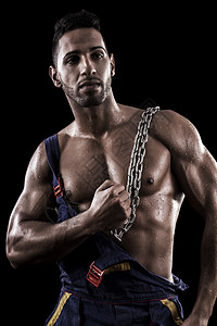 黑人背景的肌肉男男人运动阴影膀子冒充体质姿势裤子锻炼弯曲图片