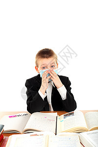 戴面具的中学生男孩家庭作业寒意学习卫生考试男性童年青少年工作流感图片