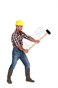 使用大锤的男子硬件拆除锤击建设者主义破坏冲击雪橇锤子金属图片