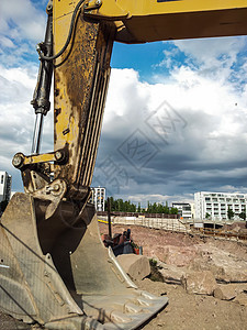 挖掘挖土机铲岩石车辆机械天空挖掘机机器运输地球搬运工土壤图片