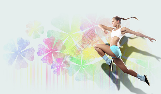运动妇女跳跃的画面活力行动平衡体操甘菊健康运动员活动演员喜悦图片