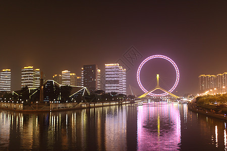 天津之夜眼花工具建筑旅行场景艺术摩天轮车轮背景图片
