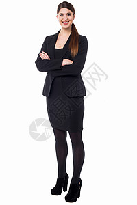 年轻自信的女商业执行官员工微笑快乐西装人士工作高跟短靴秘书商务图片