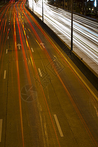 夜间汽车灯小径街道建筑驾驶商业公共汽车交通蓝色灯光城市图片
