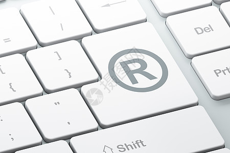 在计算机键盘背景上注册的法律概念家庭知识保险法庭白色商标数据保卫灰色执法背景图片