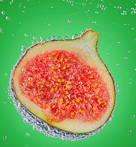 水果气泡聊天图将新无花果切成两半生产热带木头静物情调紫色饮食时间气泡收成背景