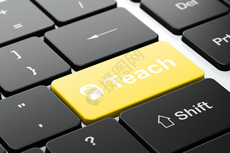 教育概念 计算机键盘背景的带齿轮和教具负责人高清图片