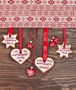 圣诞节的多彩饼干星星星形玩意儿款待丝带礼物照片糖果展示边界图片