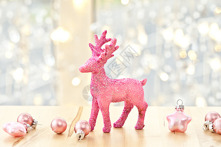 粉红鹿和圣诞节装饰装饰品时候粉色丝带玩意儿礼物饰品星形展示图片