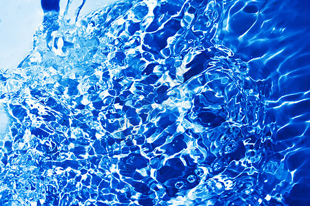 蓝水流动运动液体气泡波纹飞溅宏观海浪背景图片