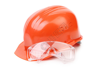 红色的硬帽和眼镜安全劳动者塑料危险技术员保护帽子工人劳动便利图片